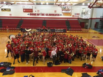 Walk The Moon poses with the Spirit of Stony Brook Marching Band before their performance together. Click on the picture to see the full Facebook post.
